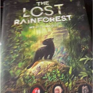 Preowned hardcover The Last Rainforest by Eliot Schrefer